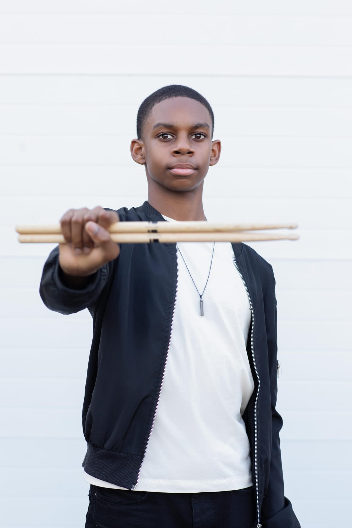 Isaiah Bedward-Hamilton with drumsticks